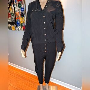 ONE TEASPOON Jumpsuit XS Black with silver snaps up the front.